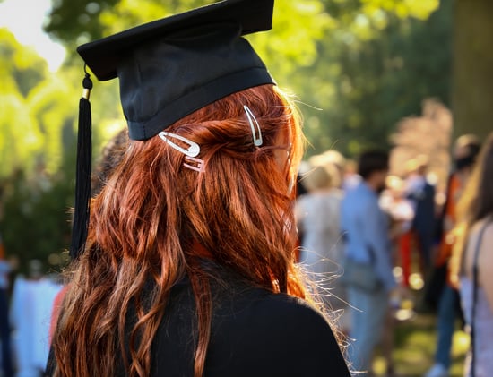 high school graduate at school ceremony